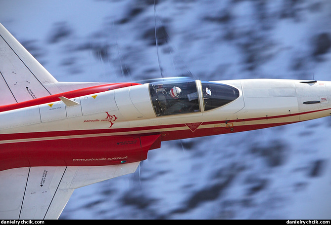 Close-up of F-5E Tiger of Patrouille Suisse with condensation effects