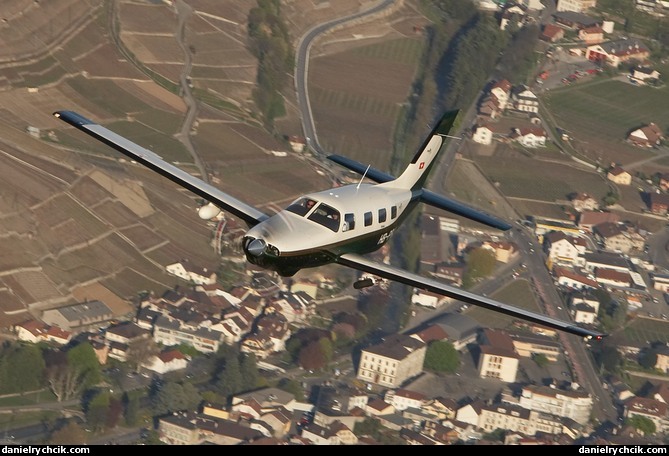 Piper Malibu HB-PRJ over the Swiss Riviera