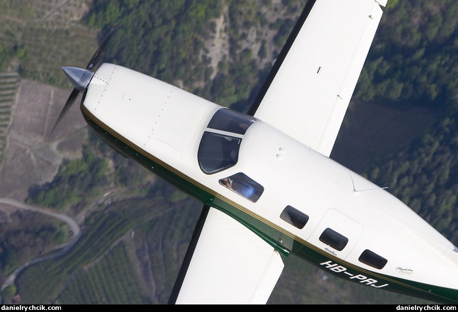 Piper Malibu HB-PRJ over Vaud