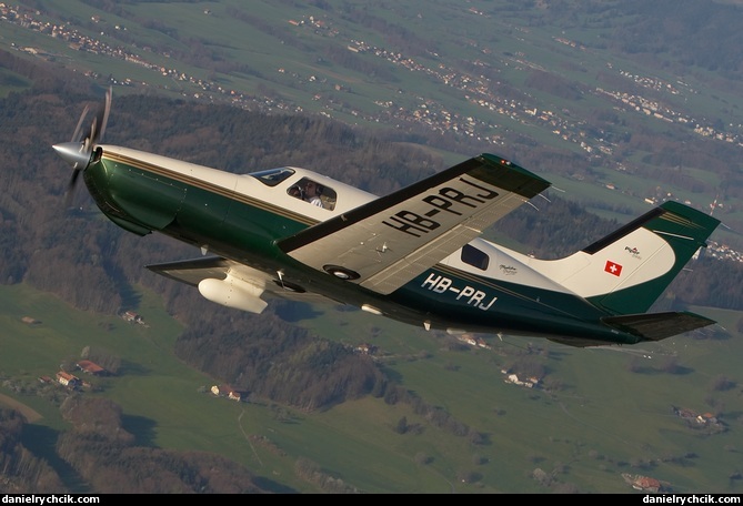 Piper Malibu HB-PRJ over Vaud