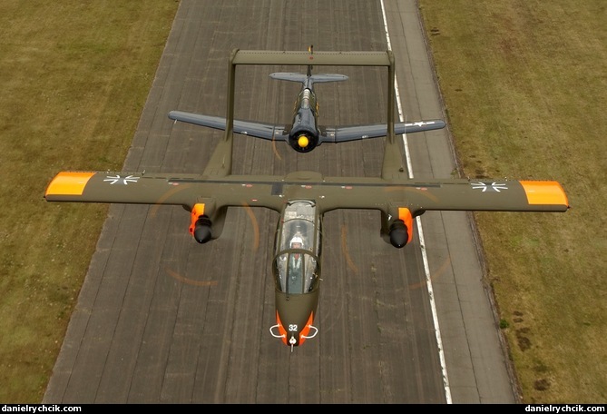 OV-10B Bronco and AT-6 Texan formation low-pass over Zoersel airfield